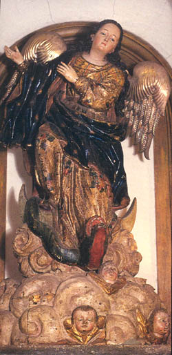 A statue of Our Lady of the Immaculate Conception crushing the head of the serpent